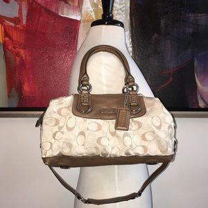Gorgeous and Real Coach beige Signature bag.
